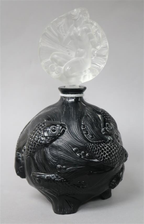 A black Lalique-style glass scent bottle